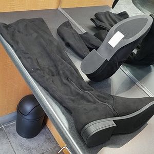 Tall black boots